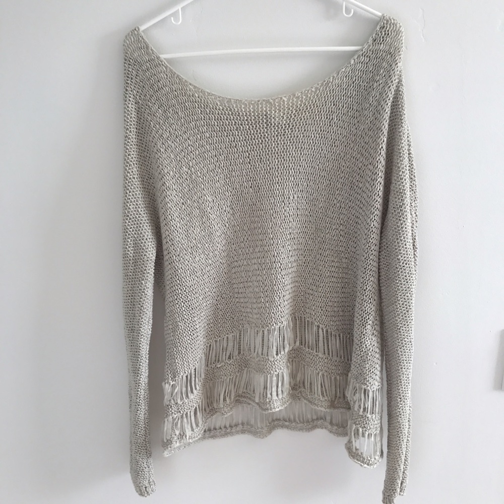 Sweater with Ribboned Cut Outs
